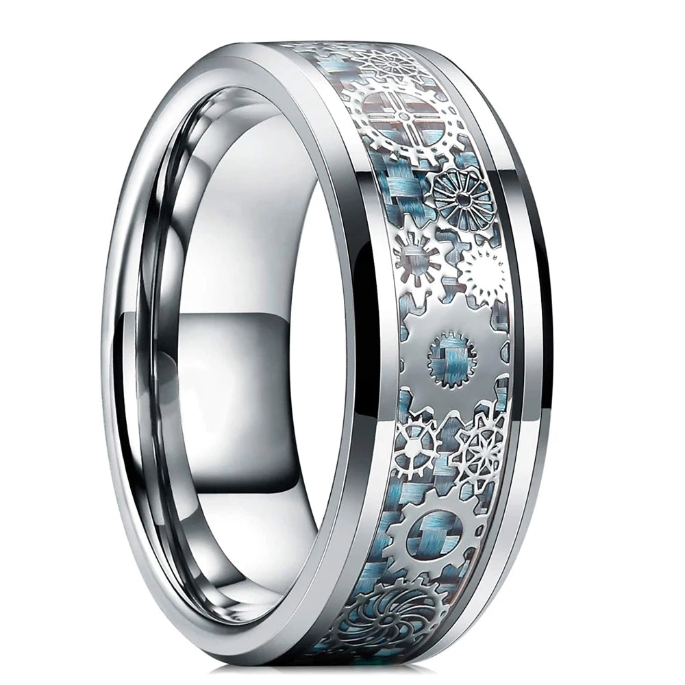 Silver ring with intricate gear design on a white background