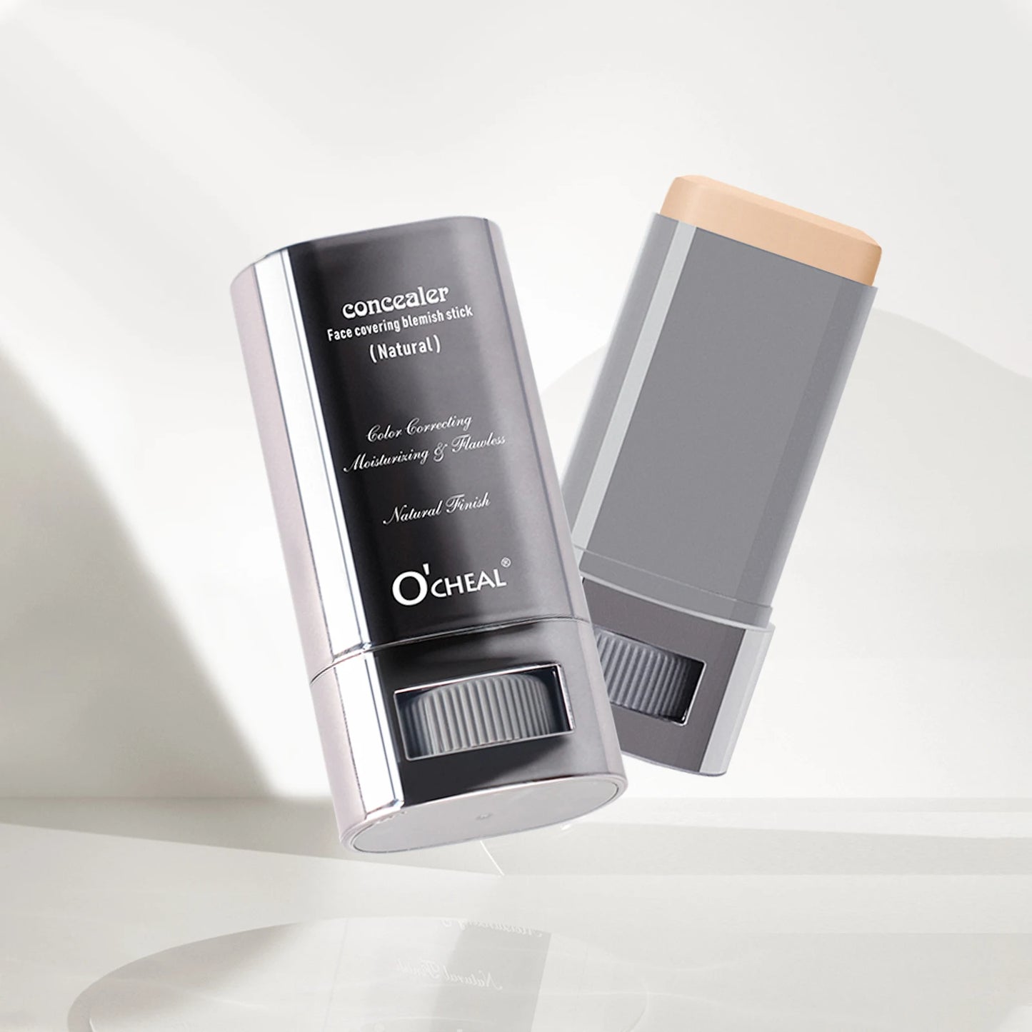 Two O'Cheal concealer sticks on a light background