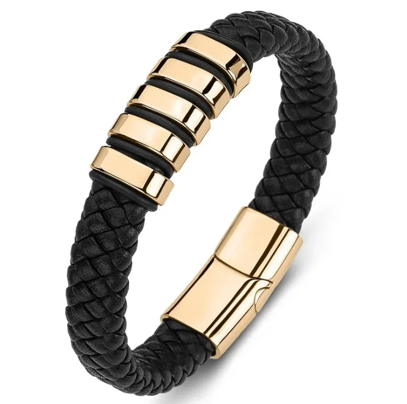 Black braided bracelet with gold accents on a white background