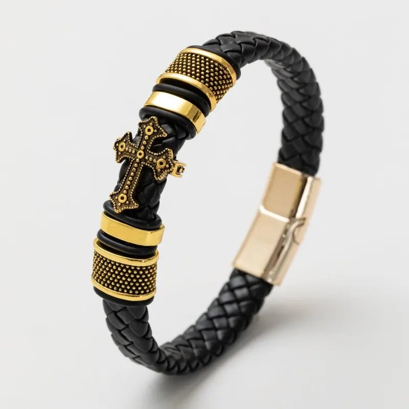 Black braided bracelet with gold accents on a light gray background