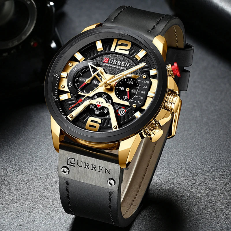 Luxury watch with black and gold design on a dark background