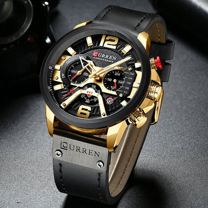 Luxury watch with black and gold design on a dark background