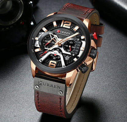 Curren watch with brown leather strap and rose gold accents on a dark background