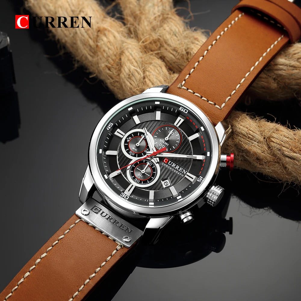 Curren watch with brown leather strap on a dark background