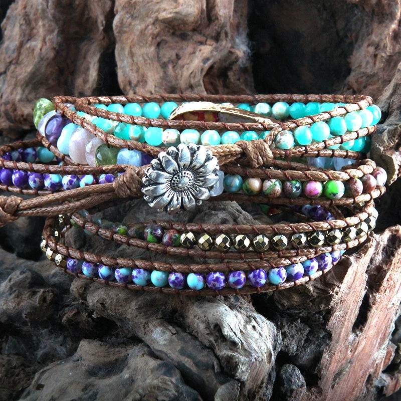 Multistrand beaded bracelet with metal clasp on a wooden surface