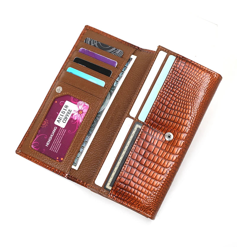 Brown leather wallet with card slots on a white background
