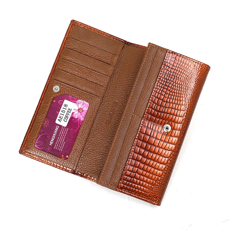 Brown leather wallet with card slots on a white background