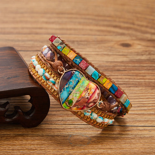 Colorful mosaic bracelet on a wooden surface