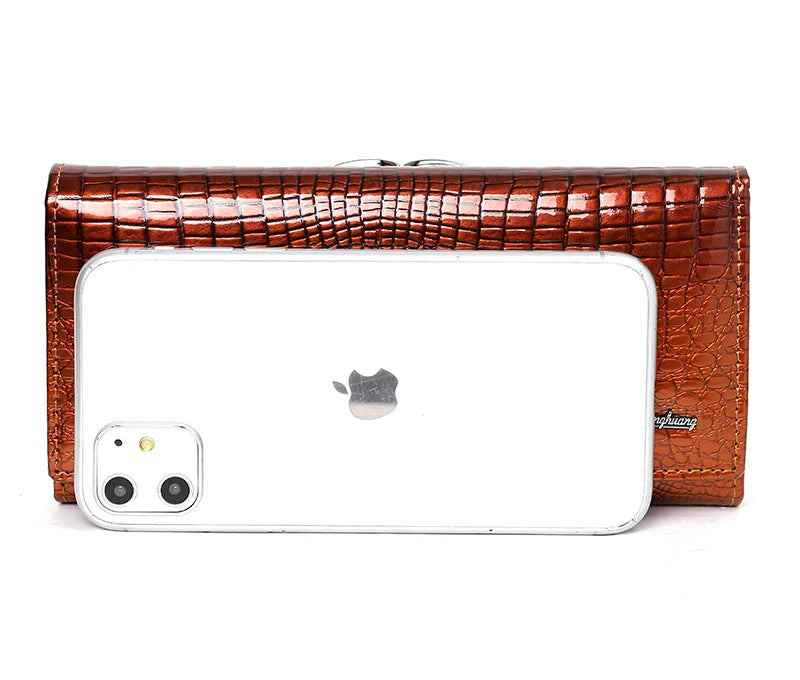 Brown crocodile-patterned phone case with an Apple logo on a white background