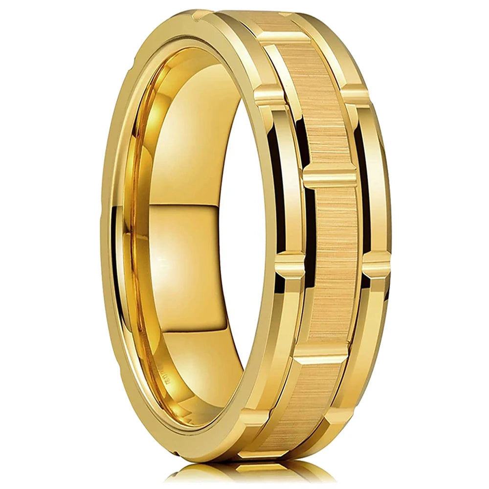 Gold ring with a reflective surface on a white background