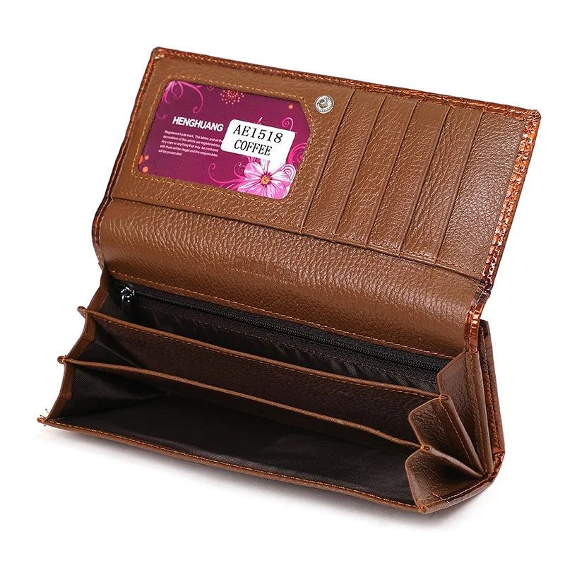 Brown leather wallet with a visible brand label on a white background