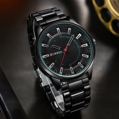 Black Curren watch with a detailed face on a dark background