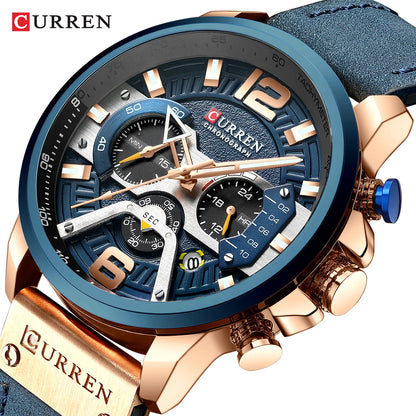 Curren watch with blue face and rose gold accents on a white background