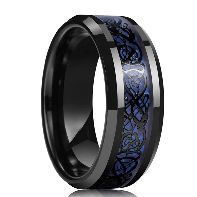 Black ring with blue dragon design on a white background