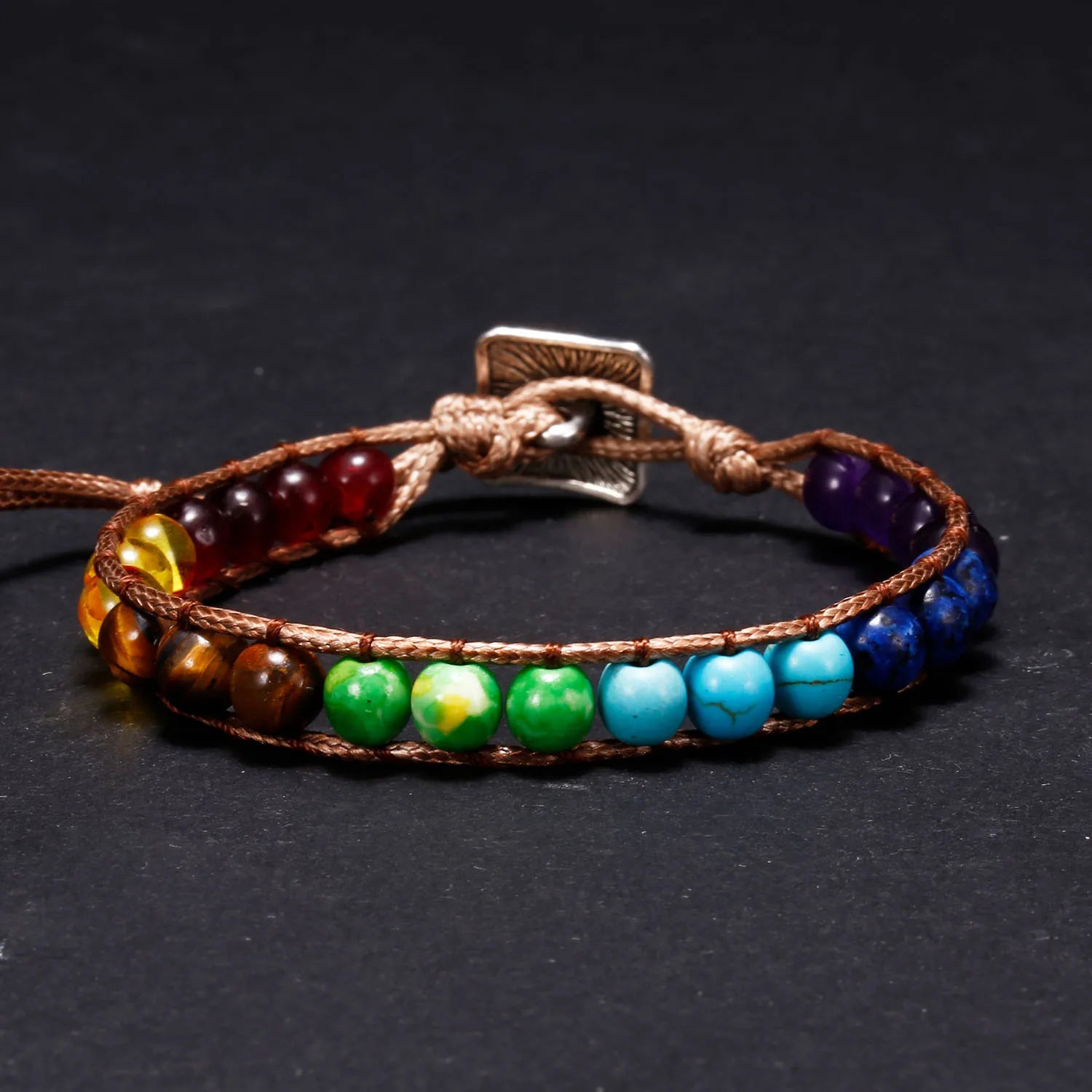 Multicolored beaded bracelet on a dark background