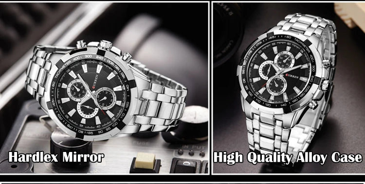 Silver watch with black face on a reflective surface, labeled 'Hardlex Mirror' and 'High Quality Alloy Case'.