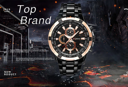Luxury watch with black and rose gold design on a dark background