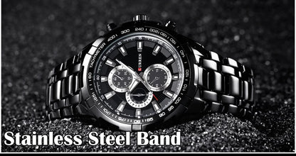 Black wristwatch with stainless steel band on a dark textured background