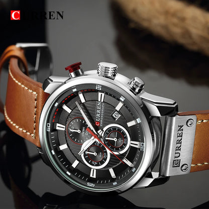 Curren watch with brown leather strap and silver case on a dark background