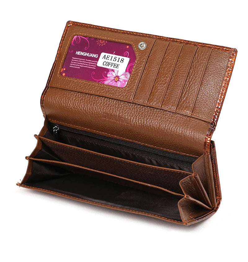 Brown leather wallet with a visible brand label on a white background