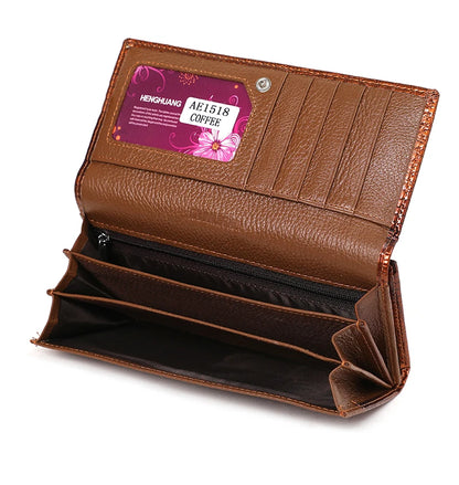 Brown leather wallet with a visible brand label on a white background