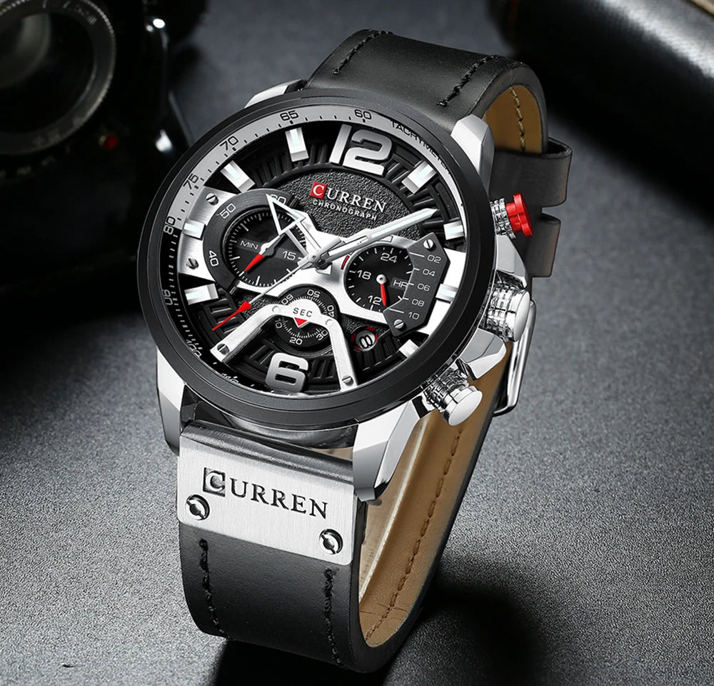 Curren watch with black leather strap and detailed face on a dark background