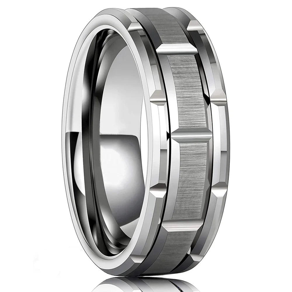 Silver ring with beveled edges on a white background