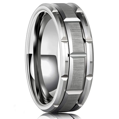 Silver ring with beveled edges on a white background