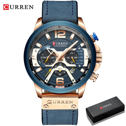 Blue Curren watch with rose gold accents and a matching box on a white background