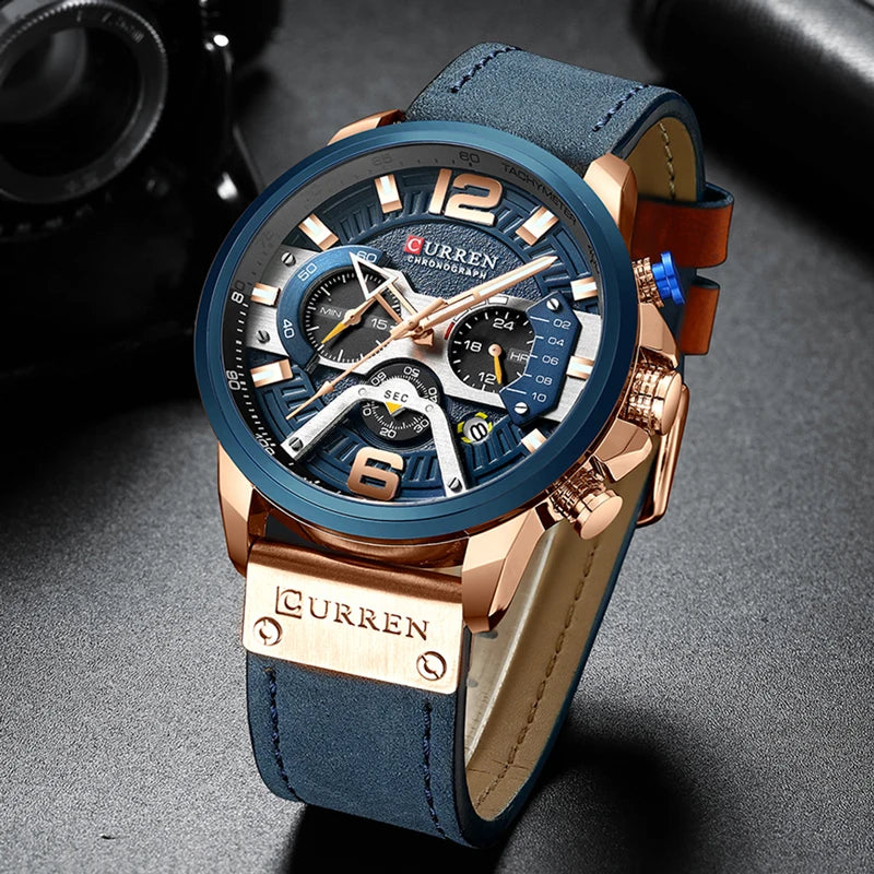 Blue and rose gold watch with 'Curren' branding on a dark background