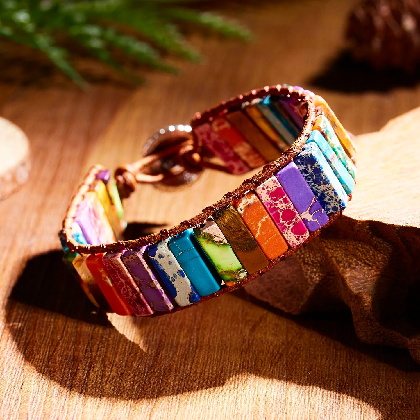 Colorful bracelet with wooden accents on a wooden surface