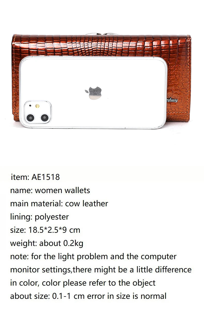 Brown crocodile-patterned wallet with a phone inside on a white background