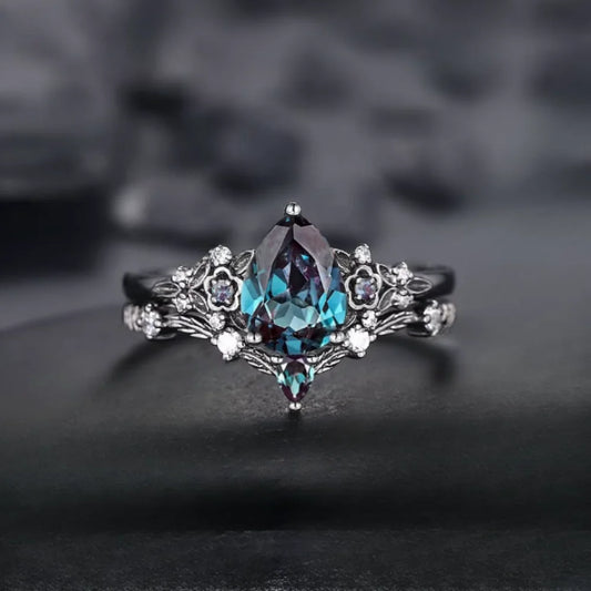 Elegant ring with a central gemstone on a dark background