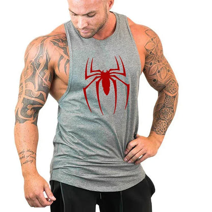Man wearing a gray tank top with a red spider logo on a white background