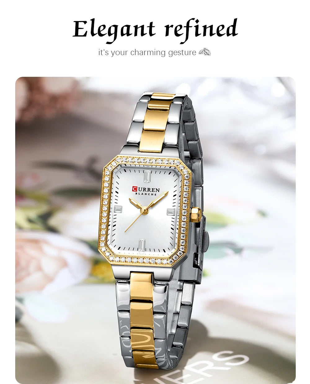 Two-tone watch with diamond-studded face on a floral background