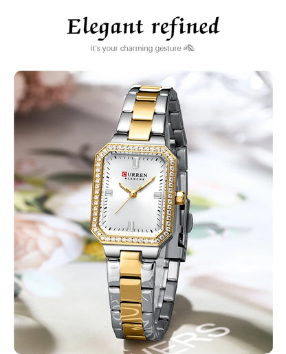 Two-tone watch with diamond-studded face on a floral background