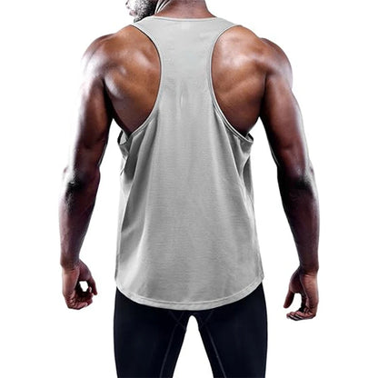 Person wearing a gray tank top on a white background