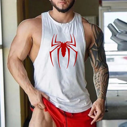 Person wearing a white tank top with a red spider logo in a gym setting