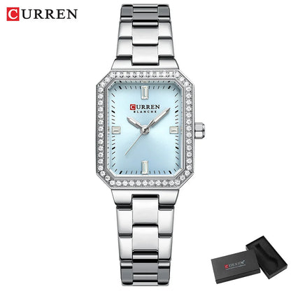 Silver Curren watch with a light blue face on a white background
