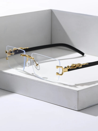 Eyeglasses with gold and black frame on a white background