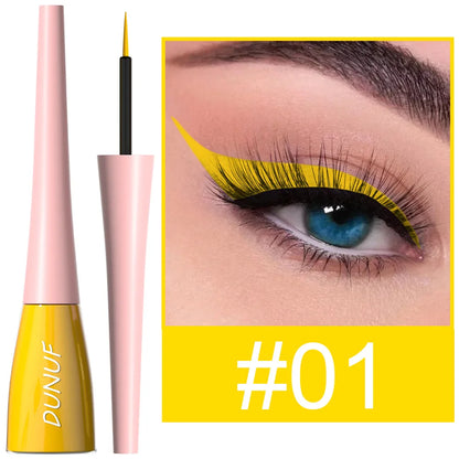 Eyeliner pen with pink and yellow design and close-up of eye wearing yellow eyeliner.