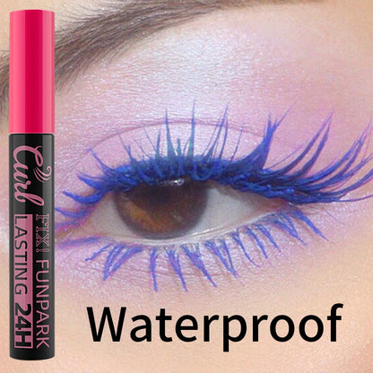 Eyelash curler with pink casing and black label on eye with blue eyelashes, labeled 'Waterproof'.