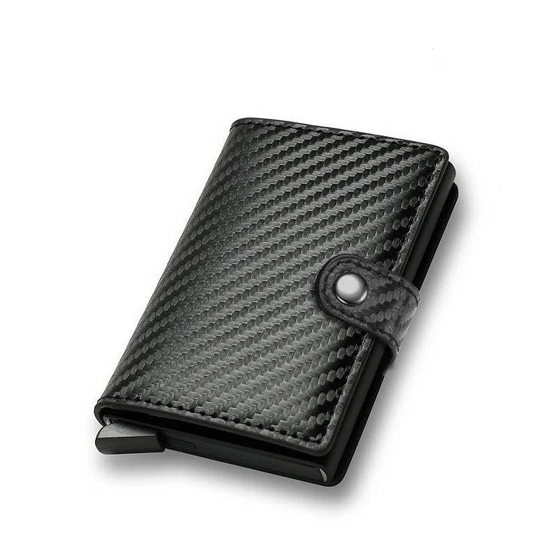 Carbon fiber patterned wallet with a metallic clasp on a white background
