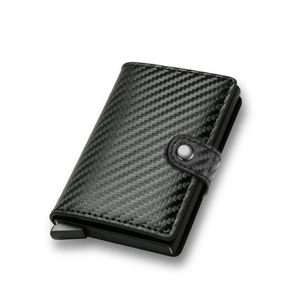 Carbon fiber patterned wallet with a metallic clasp on a white background