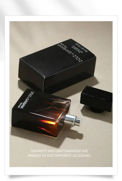 Perfume bottle and packaging on a beige background