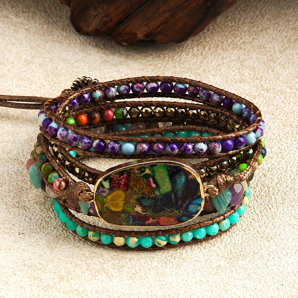 Multistrand beaded bracelet with a focal point on a textured surface