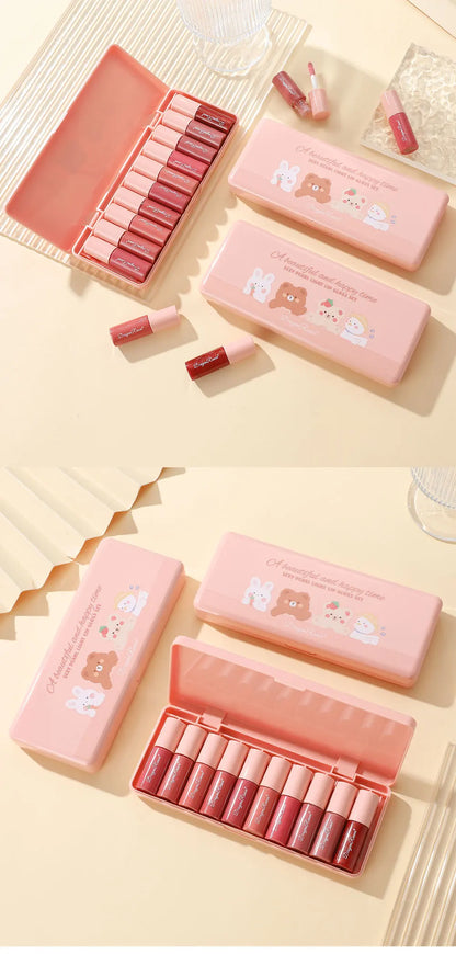 Set of lipsticks in pink and red shades with a cute design on a light yellow background