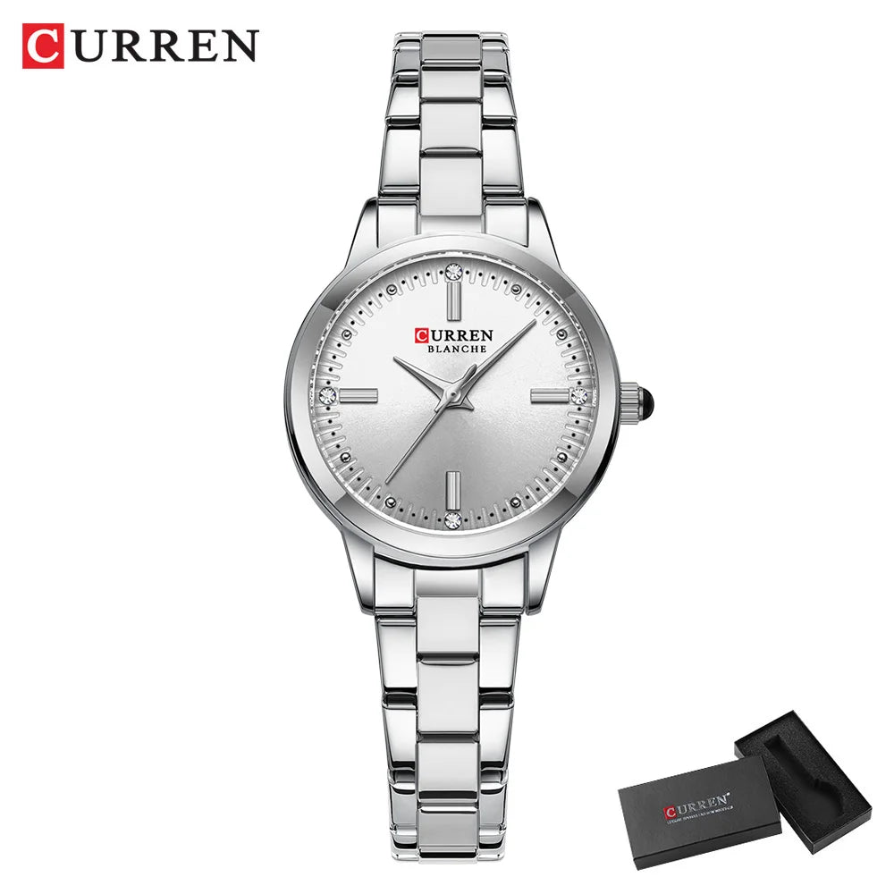 Silver Curren watch with a matching box on a white background