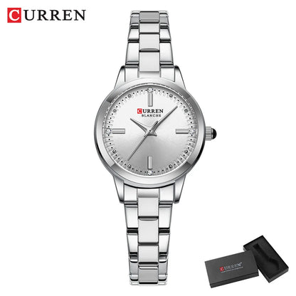 Silver Curren watch with a matching box on a white background