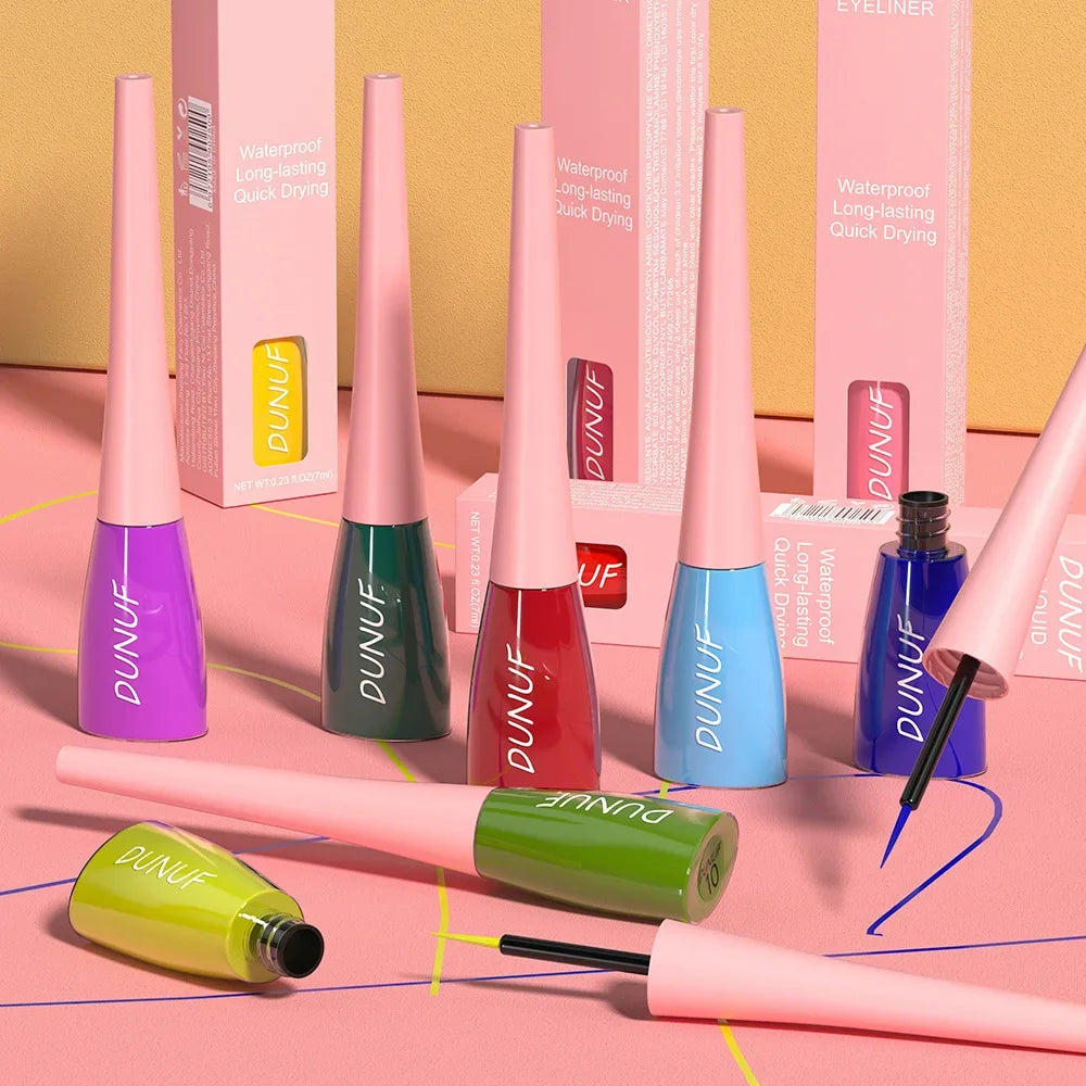 DUNUF lip gloss bottles in various colors on a pink background